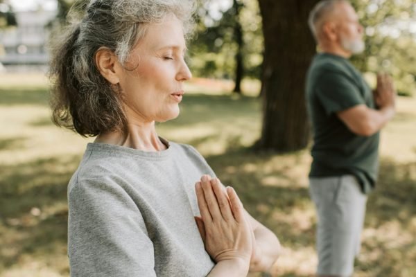 Photo of an Elderly Woman Meditating